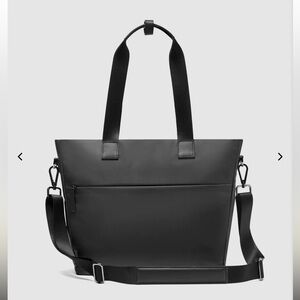 July Carry All Tote. Sleek, black and functional bag including 15” laptop sleeve